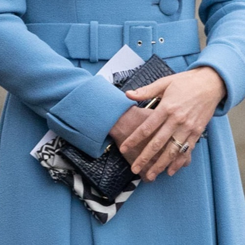 Kate carried a patterned scarf and the Strathberry Multrees Chain Wallet Clutch in Navy Embossed Croc 