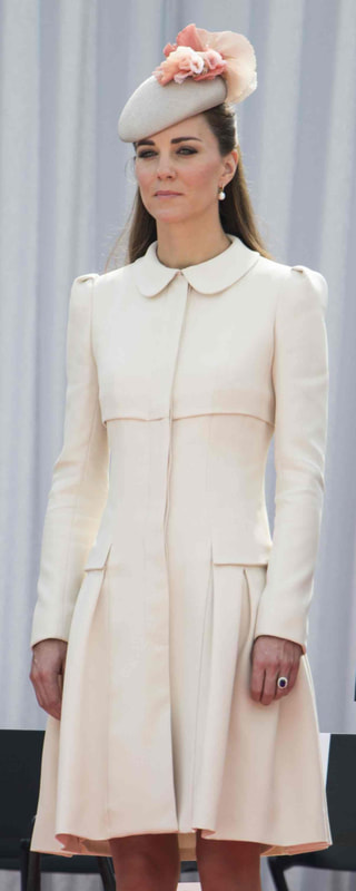 Alexander McQueen Ivory Bullet Pleat Coat with Peter Pan Collar as seen on Kate Middleton, The Duchess of Cambridge.