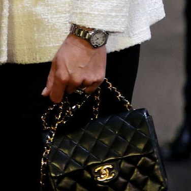 Catherine, Princess of Wales carries Chanel Mini Flap Bag in Black Lambskin