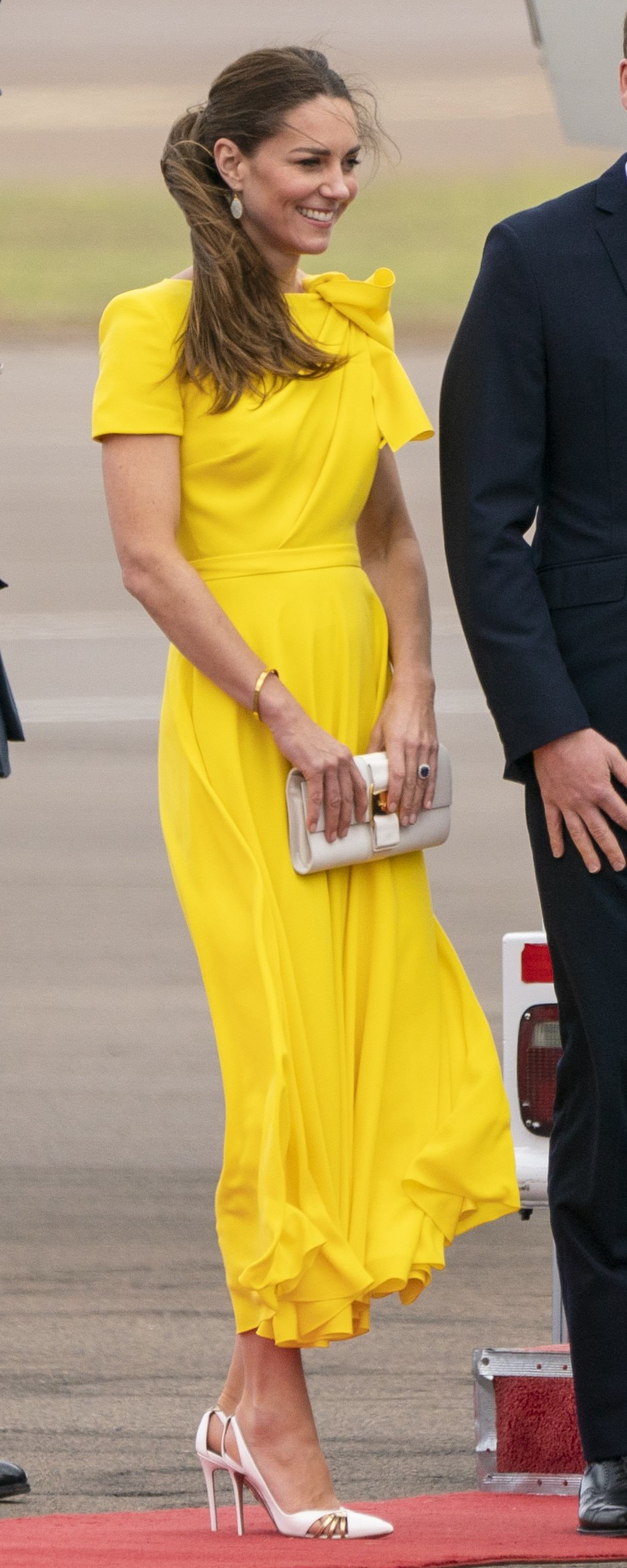 Roksanda Brigitte Bow-Shoulder Dress in Marigold as seen on Kate Middleton, The Duchess of Cambridge.