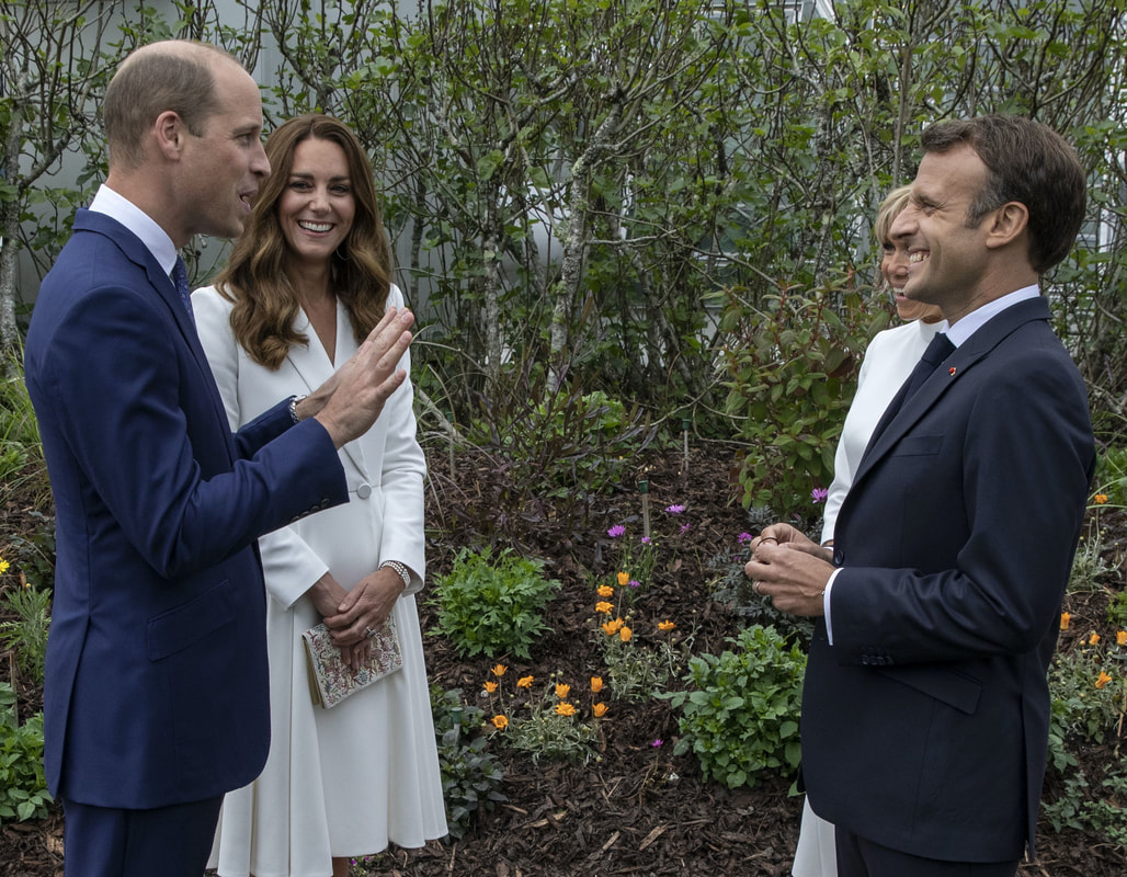 The Duke and Duchess of Cambridge chat with French President Emmanuel Macron and his wife Brigitte Macron at a drinks reception for Queen Elizabeth II and G7 leaders at The Eden Project during the G7 Summit on June 11, 2021 in St Austell, Cornwall, England. 