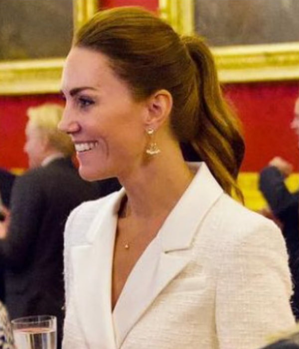 The Duchess of Cambridge held a palace reception in honor of those who worked on the 'Hold Still' project. 