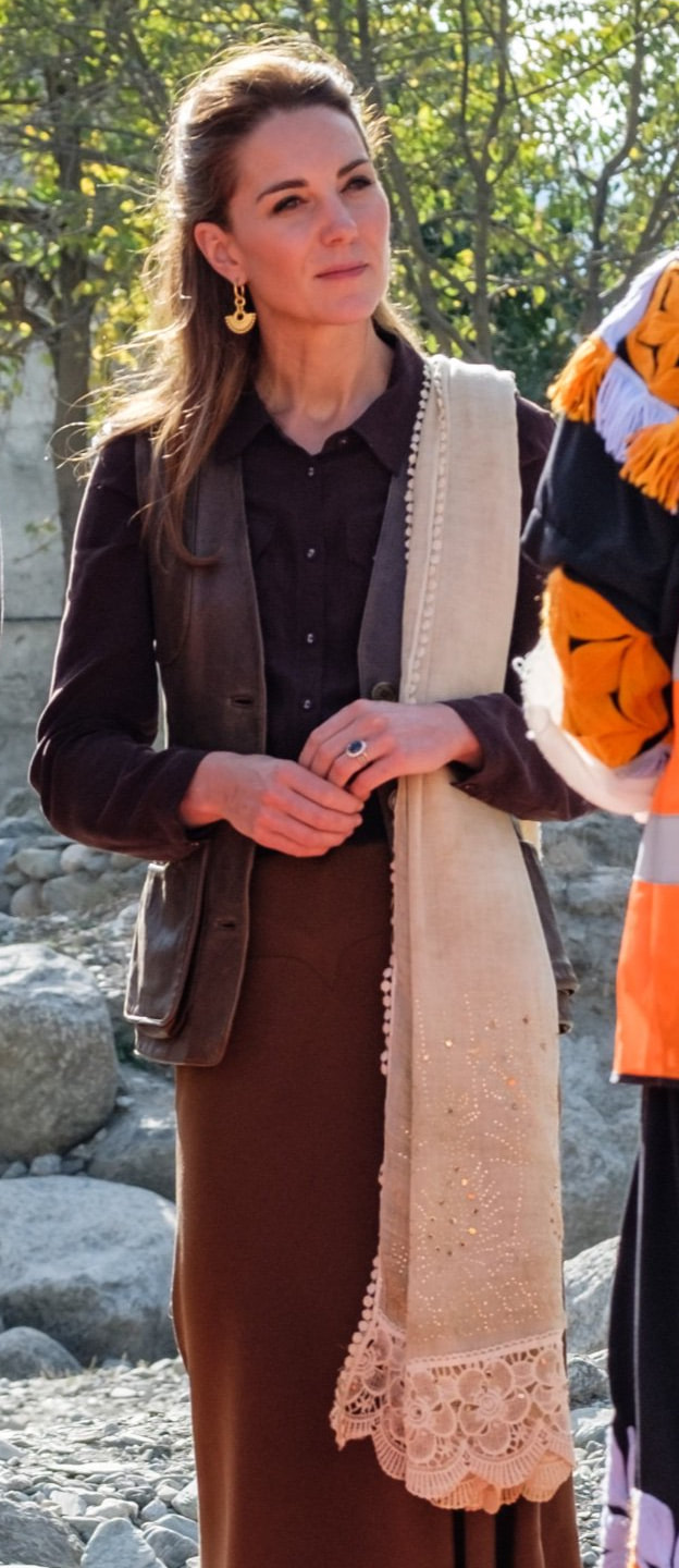 Kate, Duchess of Cambrideg wears cream bobble-trim scarf in Chitral
