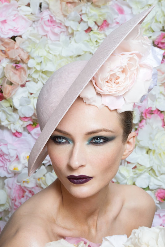 Philip Treacy SS16 molded slice hat with rosettes