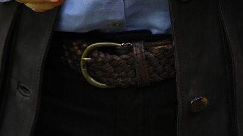 Kate wears a brown woven belt